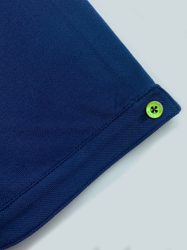 Navy Polo with GREEN Buttons.