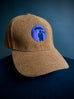 Corduroy Baseball Cap. Tobacco/Lilac Logo.
