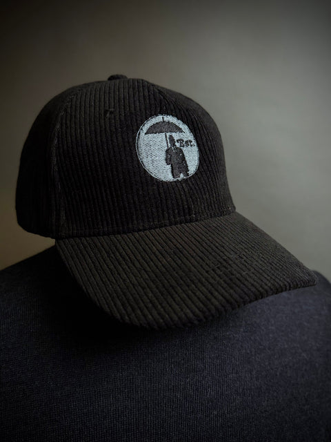 Corduroy Baseball Cap. Black/Grey Logo.