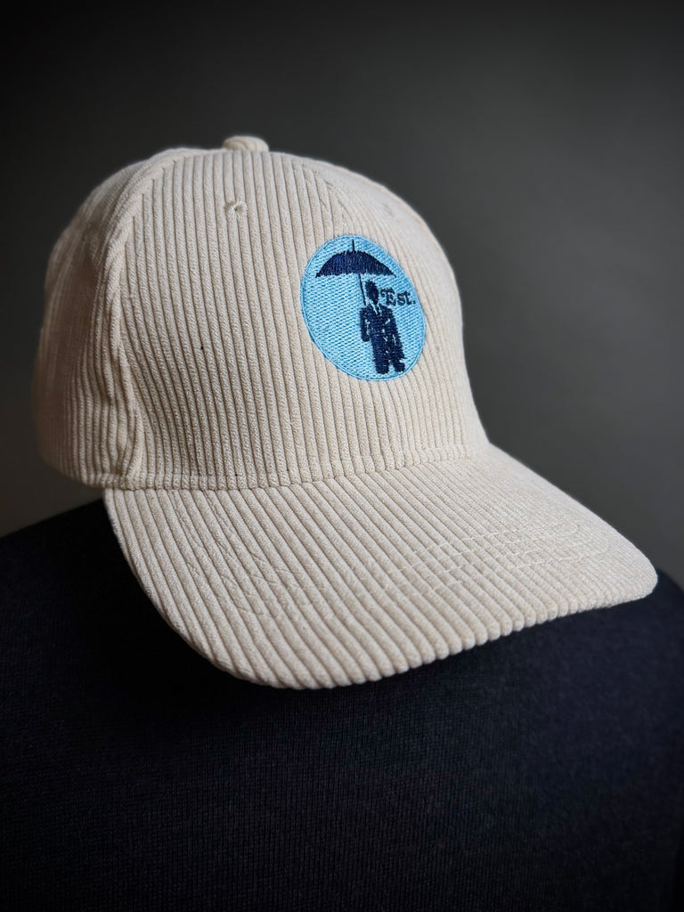 Corduroy Baseball Cap. Cream/Pale Blue Logo. (Copy)